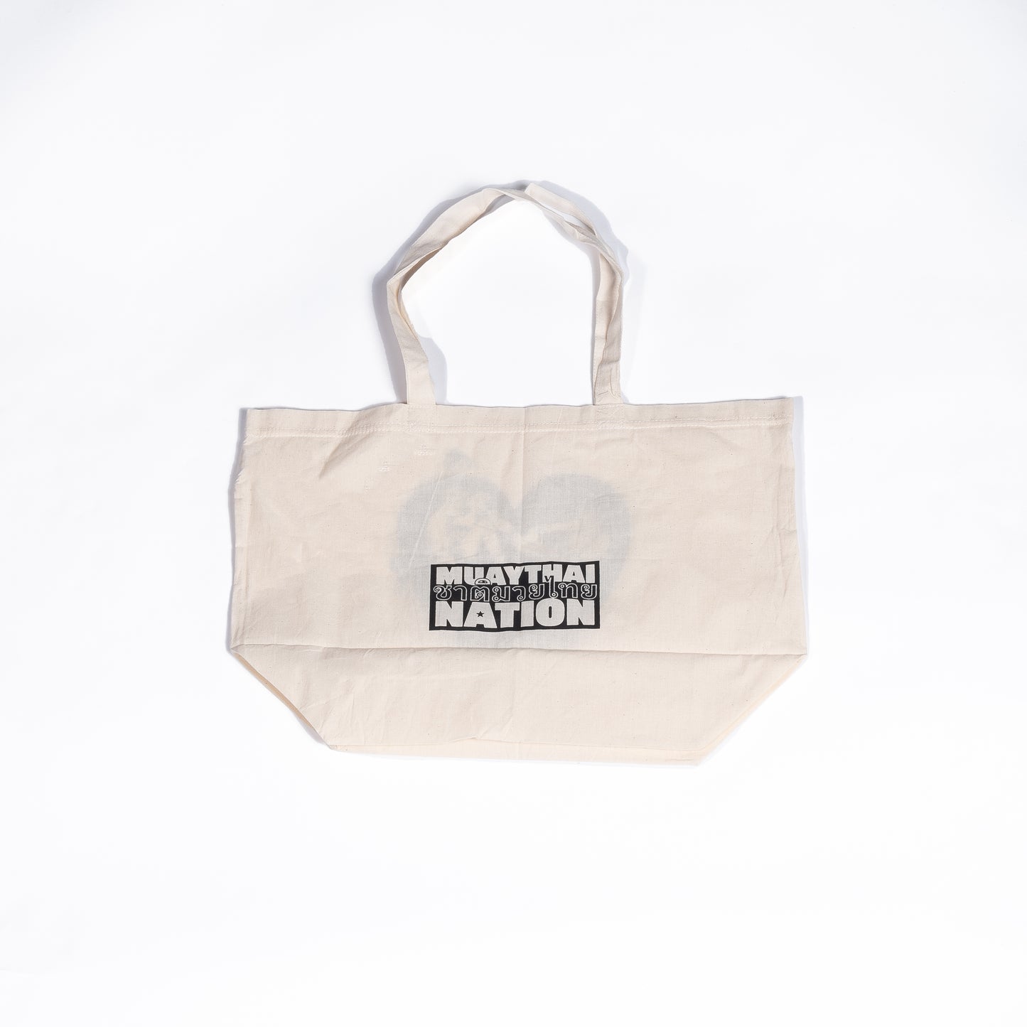 Muay Thai Nation cream-colored canvas gym tote bag showcasing a centered minimalist black block logo print