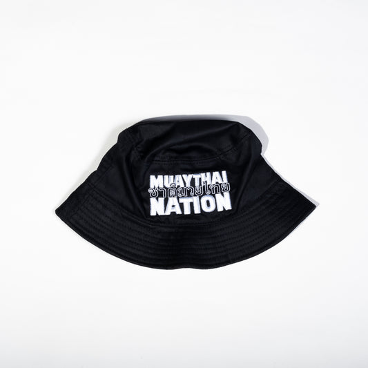 Muay Thai Nation black 100% cotton bucket hat featuring bold stacked white embroidered brand logo text