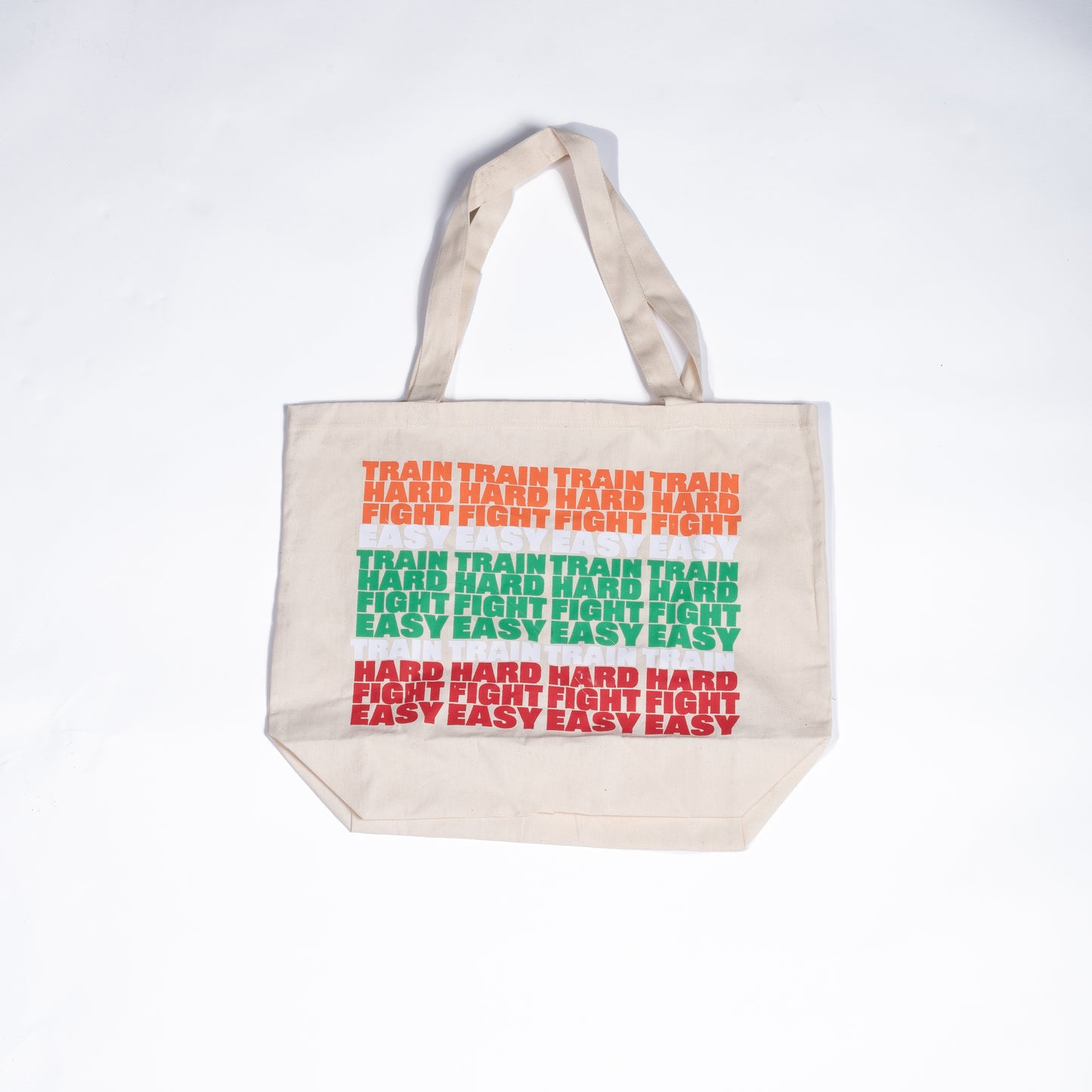 Muay Thai Nation Lucky 7 canvas tote bag featuring stacked retro orange green and red text graphics