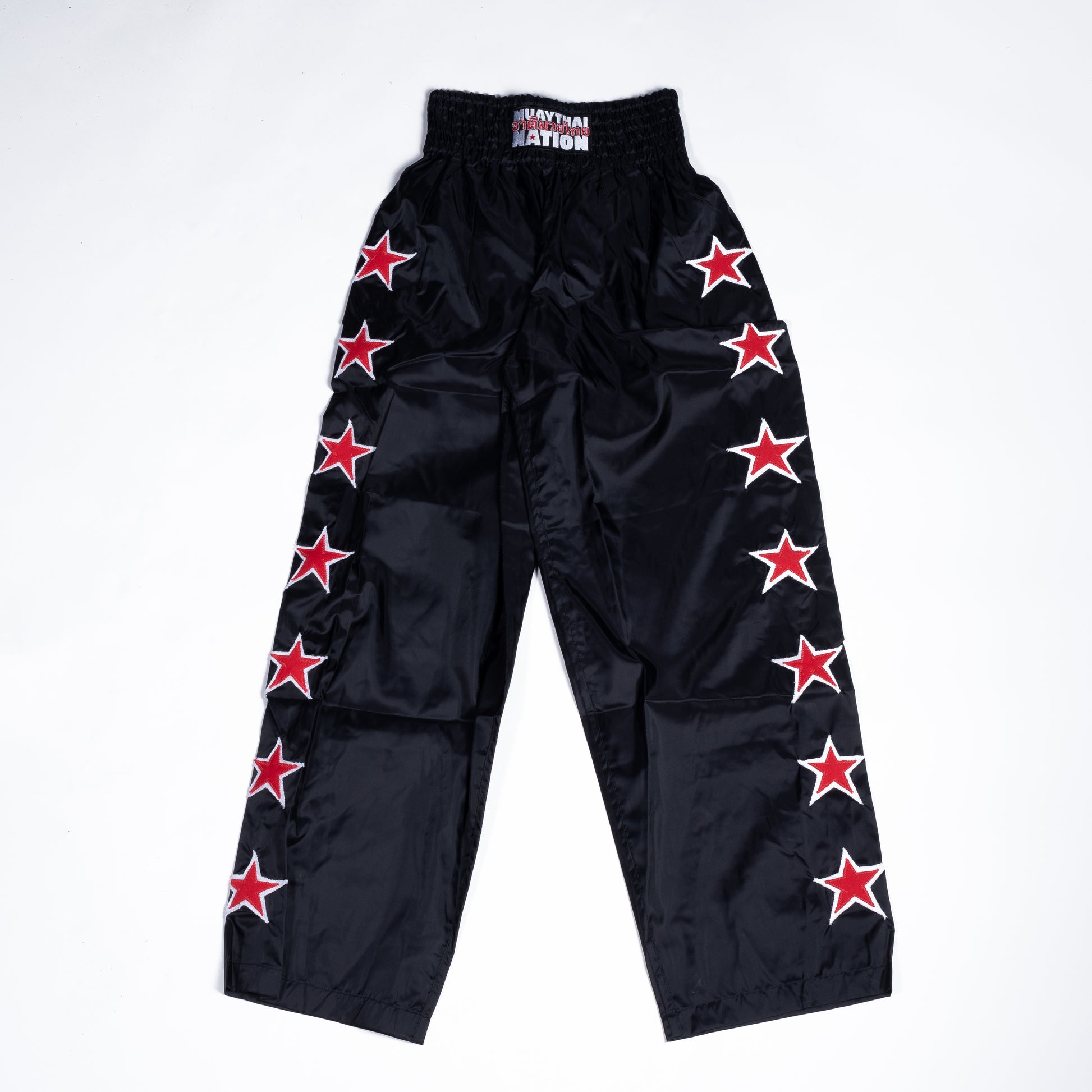 Muay Thai Nation tracksuit pants black and red back view