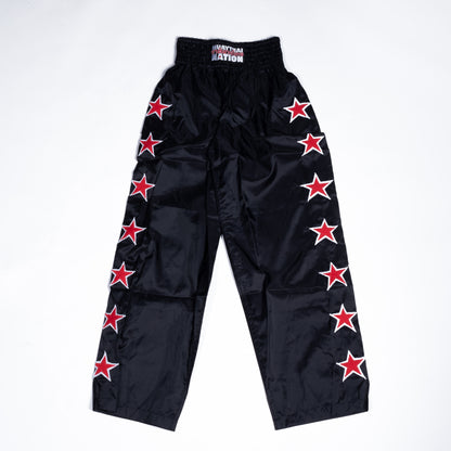 Muay Thai Nation tracksuit pants black and red back view
