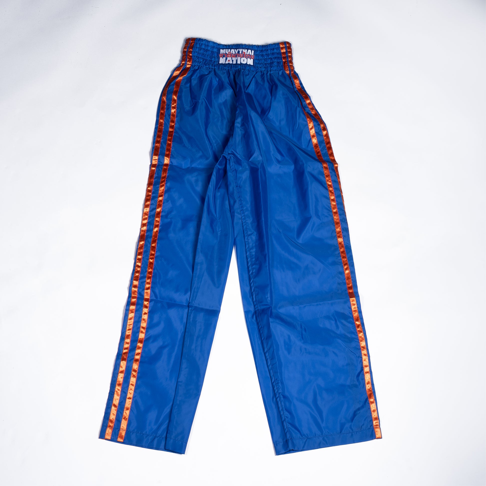 Muay Thai Nation blue tracksuit pants front view