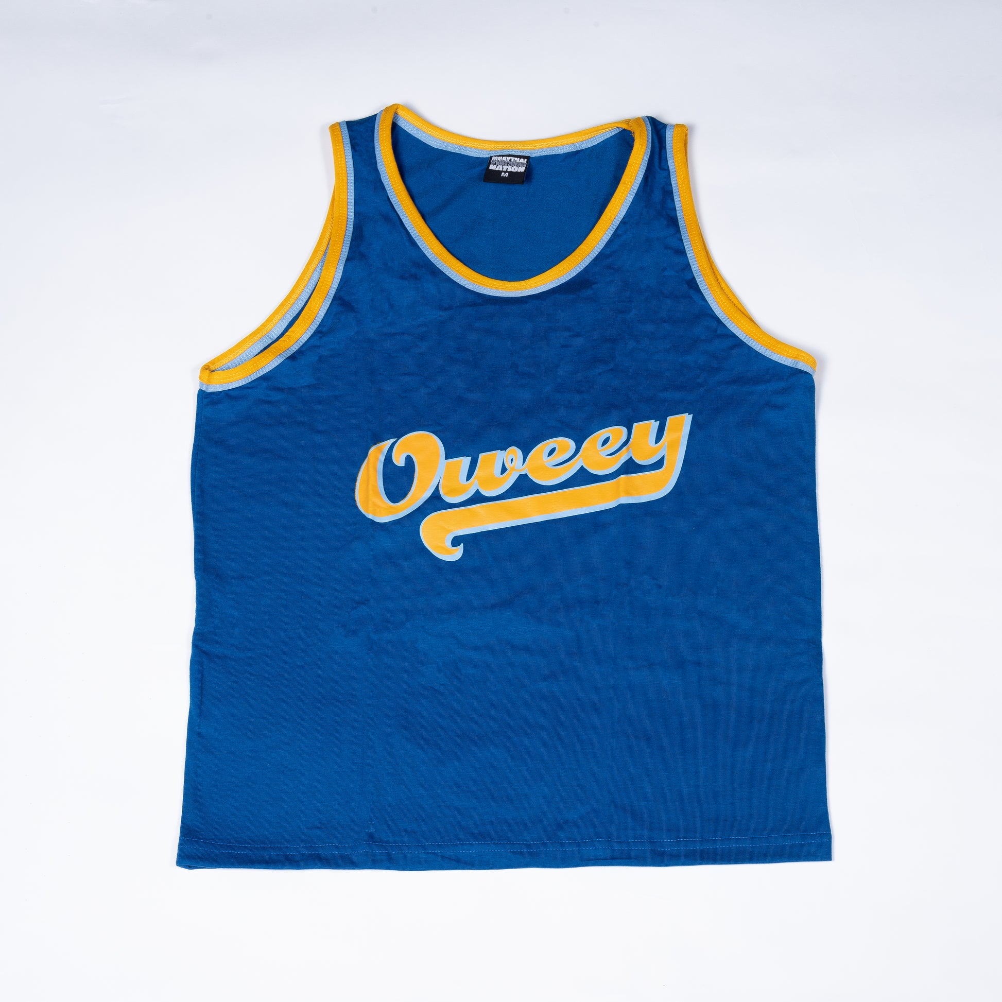 Muay Thai Nation "Oweey" standard combat tank top in royal blue with yellow lettering.
