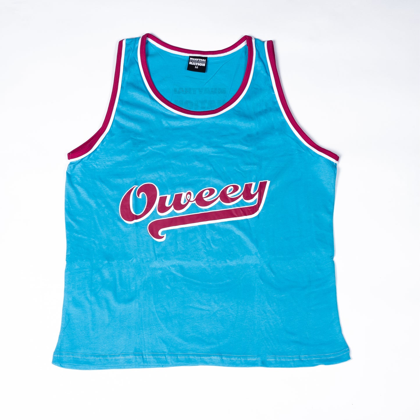 Muay Thai Nation "Oweey" standard Miami Vice style tank top in teal with bright pink trim.