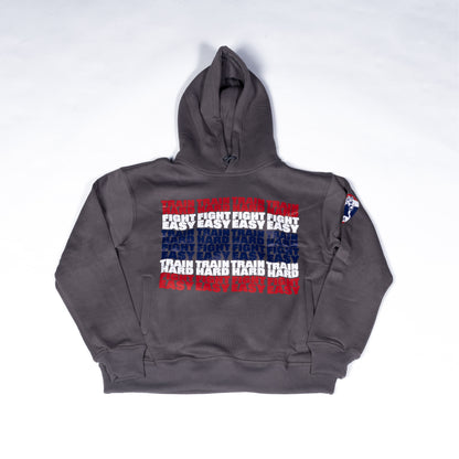 Front view of Muay Thai Nation standard dark grey hoodie with a red, white, blue striped graphic.