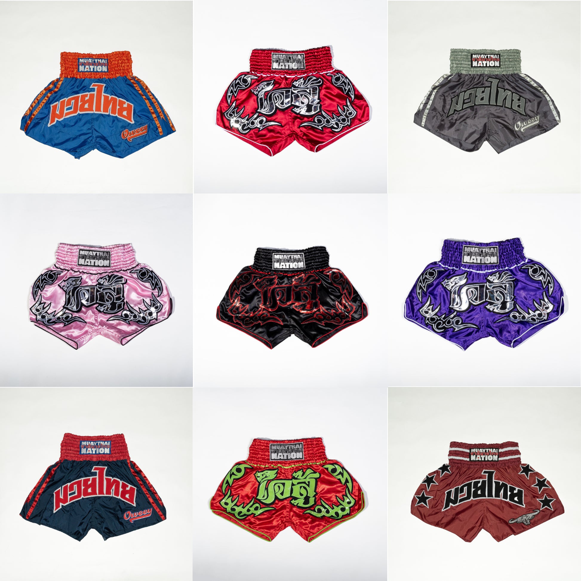 Collection of colorful muay thai shorts with brand logo on a white background